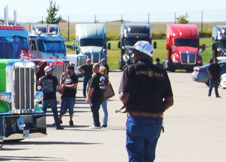 truck driver walking across parking lot