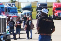 truck driver walking across parking lot