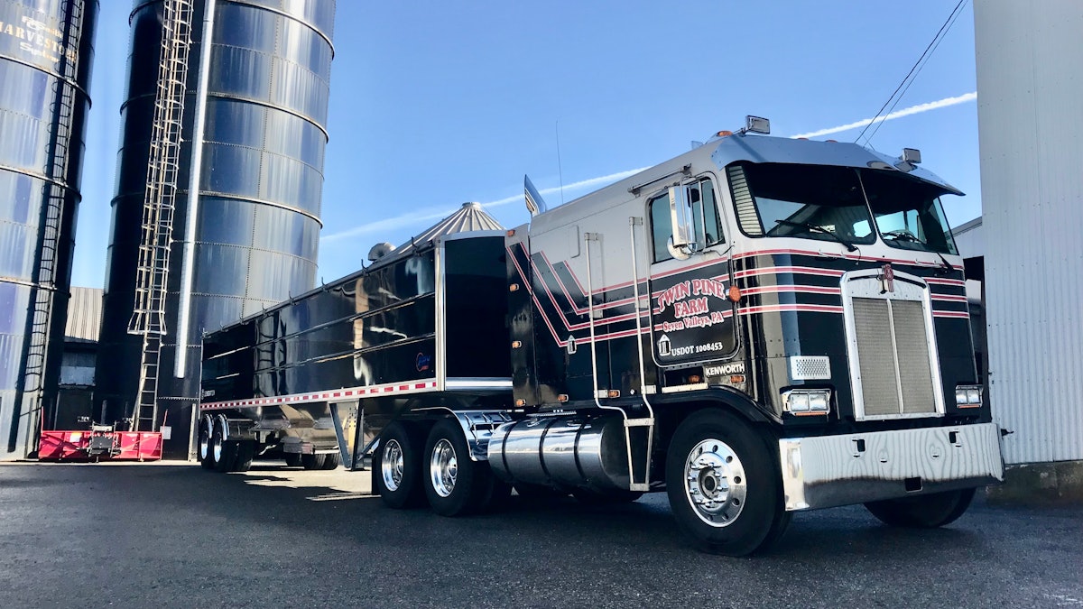 https://img.overdriveonline.com/files/base/randallreilly/all/image/2023/12/Twin_Pine_Farms_1985_Kenworth_K100_2023_EBY_2.6571df31ae58e.png?auto=format%2Ccompress&fit=max&q=70&rect=69%2C416%2C3963%2C2230&w=1200