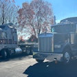 Elam Martin's 1985 Kenworth K100 and 1989 W900B