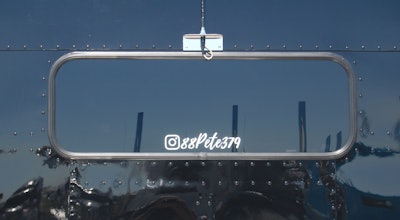 Jarrett Landry's 1988 Peterbilt 379 Instagram handle on sleeper window