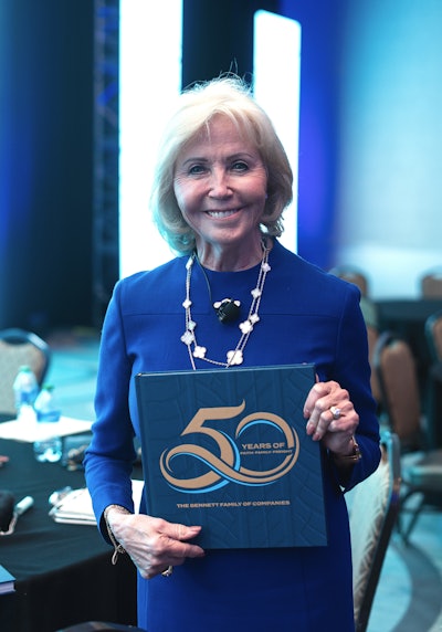 Bennett 50th Anniversary book held by Marcia G. Taylor