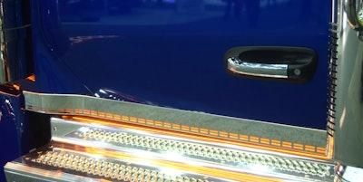 Rocker panels below both cab and sleeper feature the same cutout design as on the grille, breathers and elsewhere. Shown here, too: strip lighting effects within the lights package.