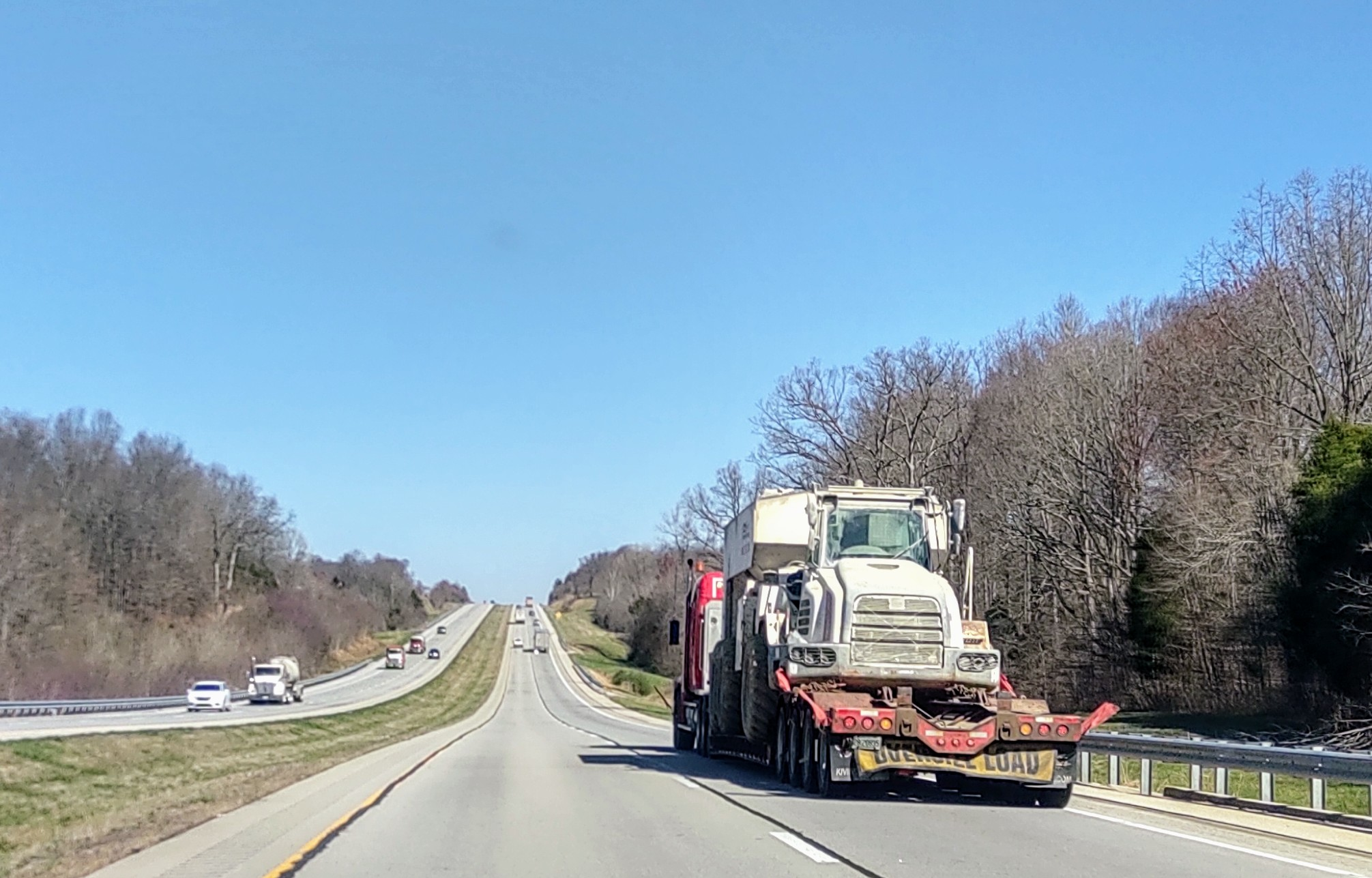 Lowboy Toting Vehicle