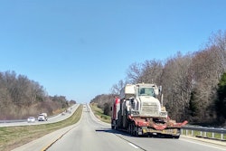 Lowboy Toting Vehicle