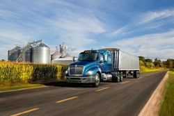 International LT series truck by a cornfield