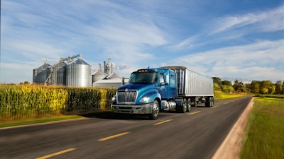 International LT series truck by a cornfield