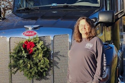Candace Marley with her Peterbilt 579 dressed up for Wreaths Across America