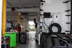 Truck in a service shop waiting to be worked on