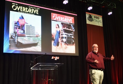 Jason Cowan onstage with two 1970s Overdrive magazine covers