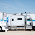 Atlas Van Lines truck show featuring big-bunk trucks