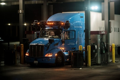 A Waymo Via autonomous truck gets serviced by a safety driver at a QuikTrip truck stop just south of Dallas, Texas, on Sunday, June 26, 2022. Autonomous trucks are targeting long haul and line haul trucking markets. Estimates have stated that these machines will be able to lower current operating costs between 30 to 45 percent and more than double a truck’s utilization rate.