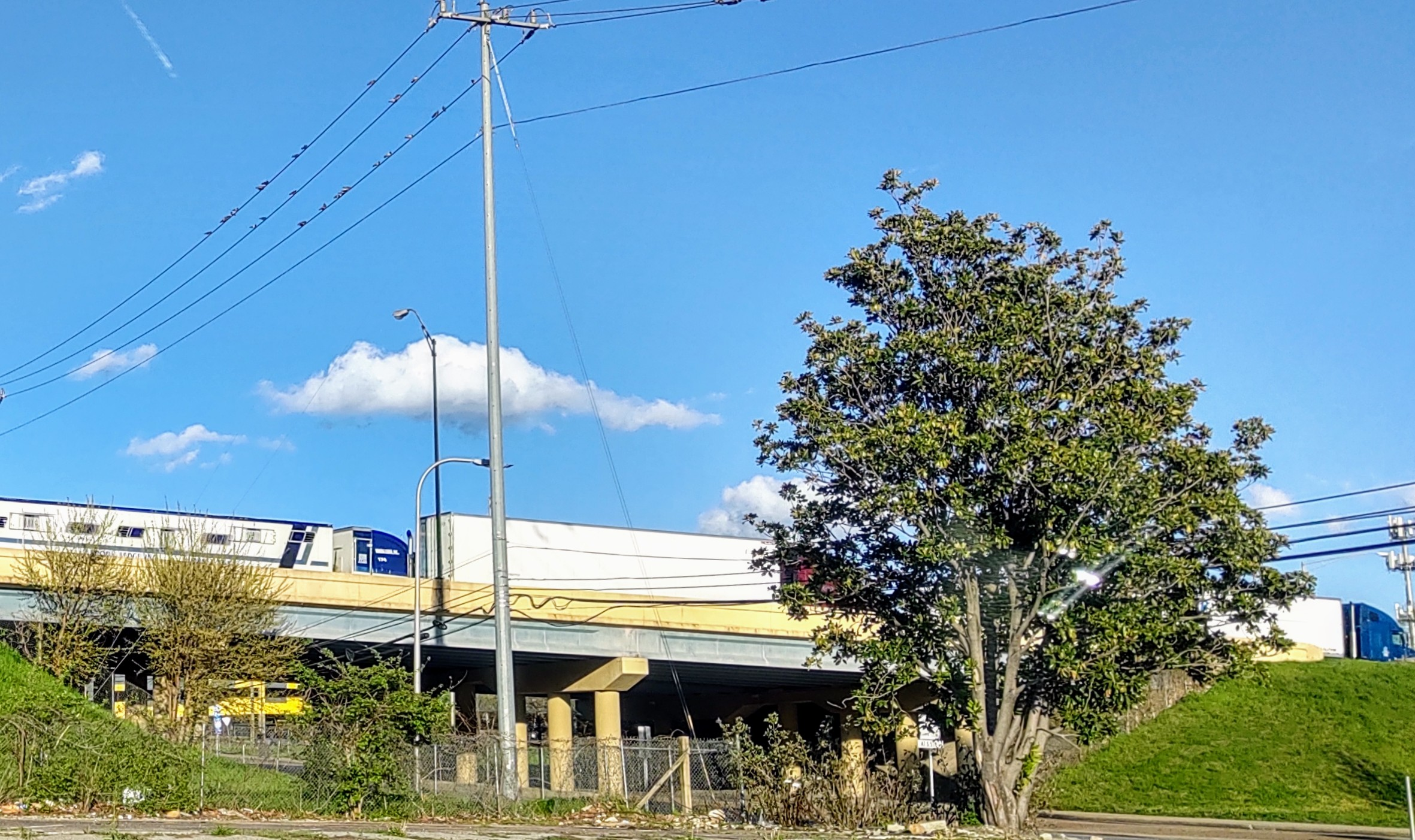 Truck Trailer On Highway From Below Bridge