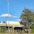 Truck Trailer On Highway From Below Bridge