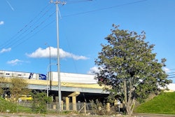 Truck Trailer On Highway From Below Bridge