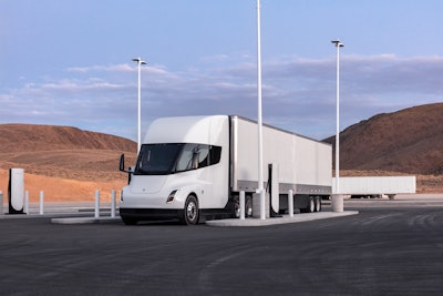 A Tesla Semi truck parked for charging.
