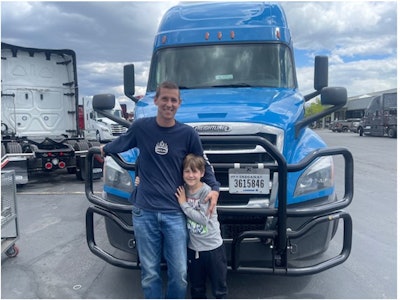 Vince Fazio stands in front of his truck, with a new Ex-Guard, with his son. Fazio was awarded a the new protector after he was struck by a hit-and-run drunk driver. Ex-Guard provided the new guard and Premier Truck Group of Salt Lake City provided installation.