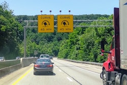 truck headed toward sharp curve