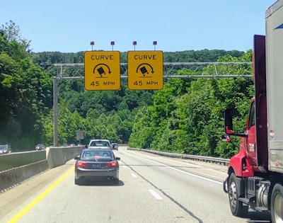 truck headed toward sharp curve