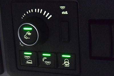 HVAC controls in VNL up front of the cab above driver