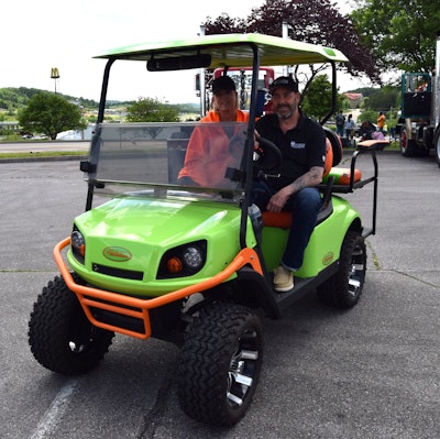 Rob and Karen Hallahan in custom golf cart