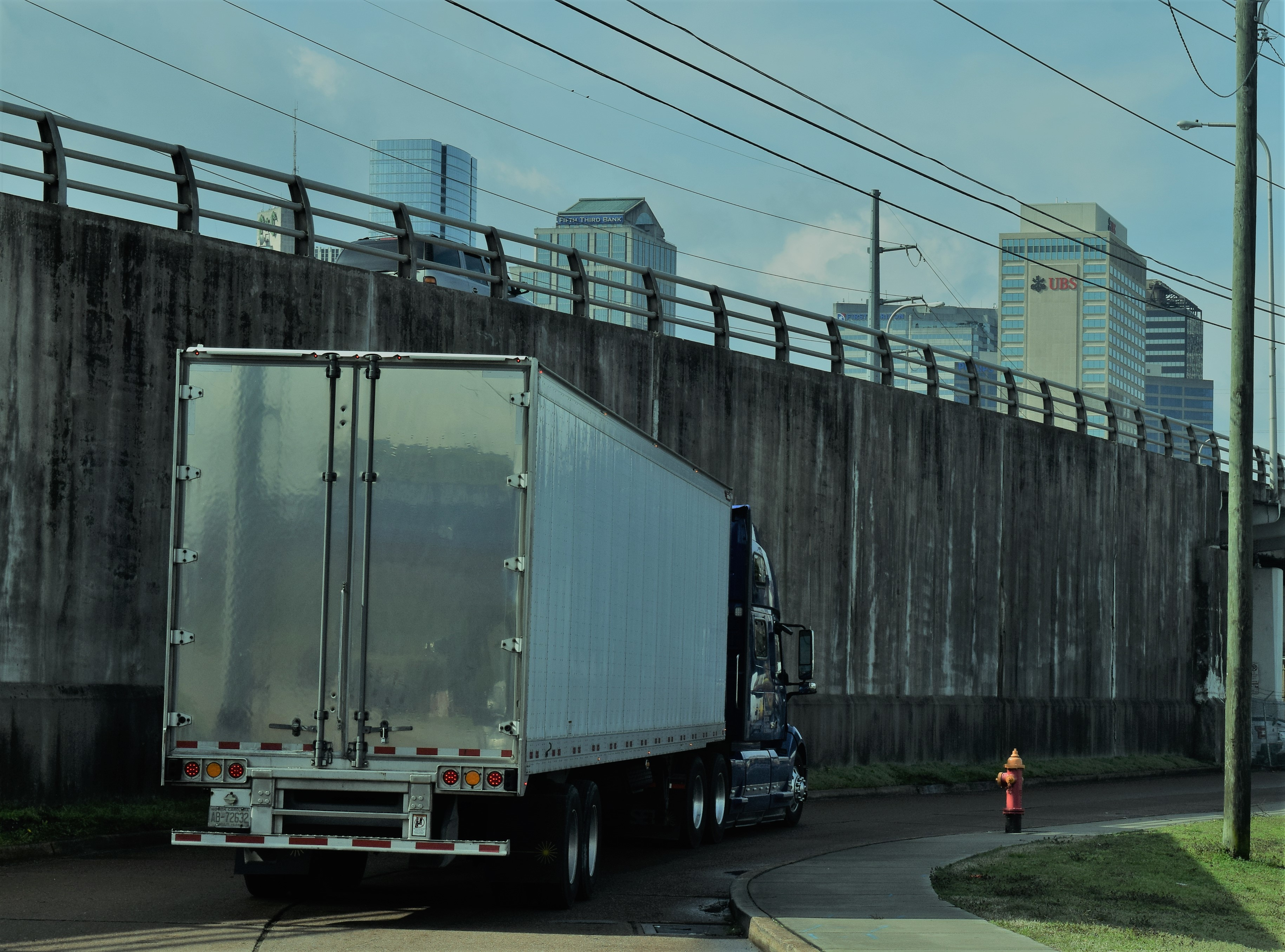 Truck turning next to highway