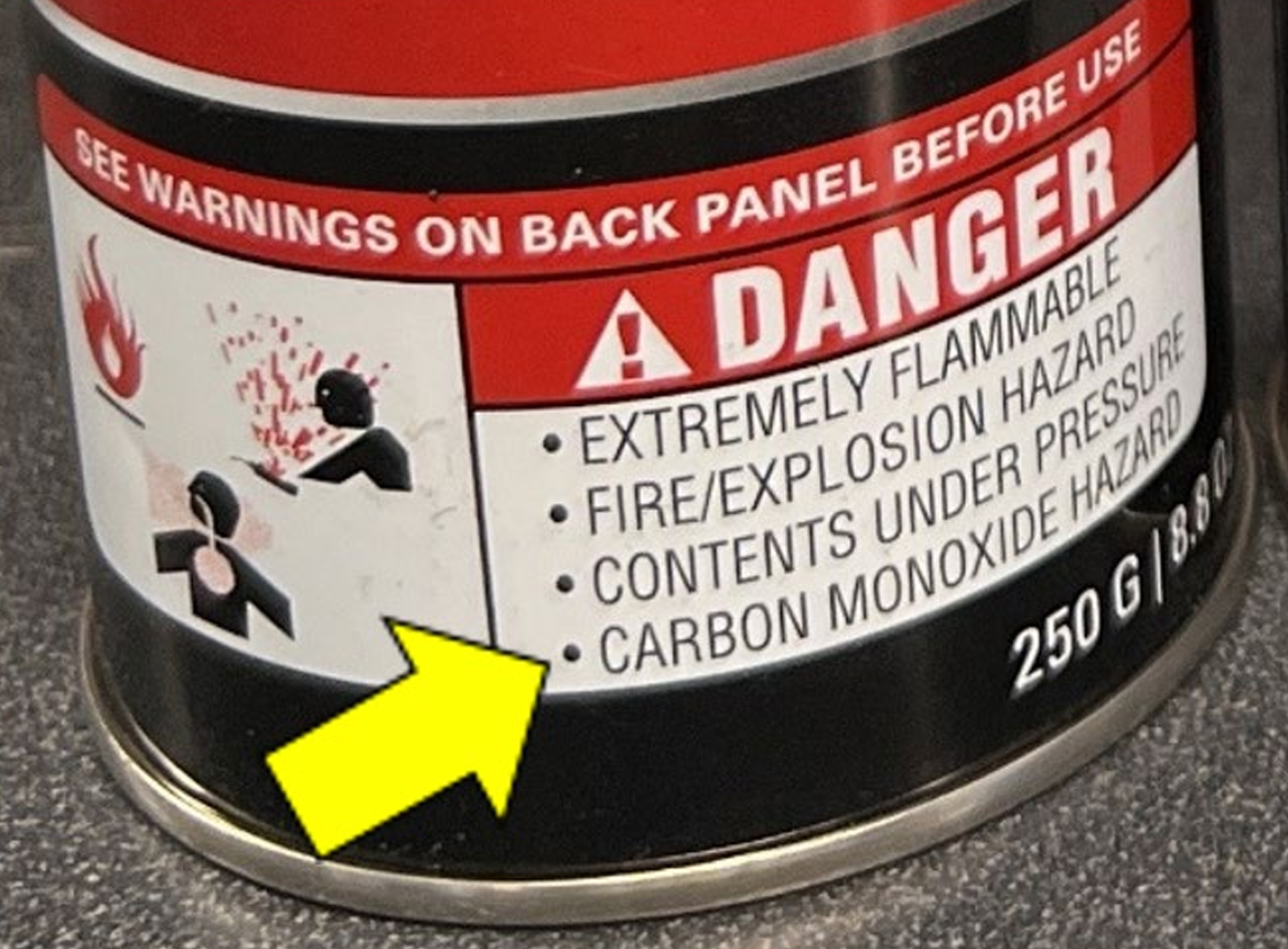 Carbon monoxide warning on bottle of butane
