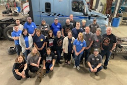 K&J Trucking staff in front of truck