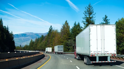 Trio of trailers on highway