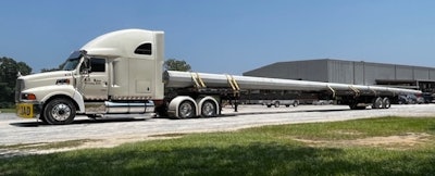 Dustin Ross' 2000 Sterling pulling a 105-foot concrete pole