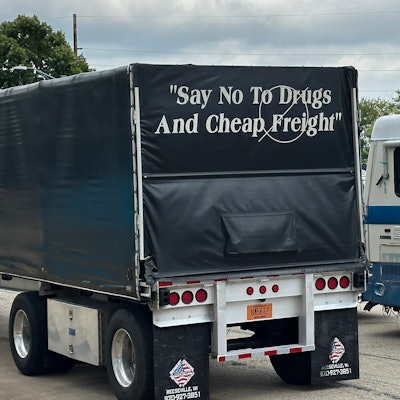 'Say not to drugs and cheap freight' quote on the back of a trailer