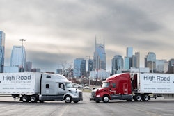 Two High Road trucks, Nashville skyline