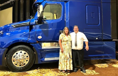 John and Jo Fuller, with Fuller's lucky 2025 Freightliner Cascadia
