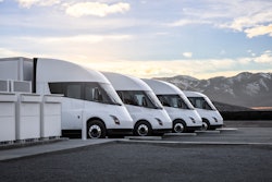 Four Tesla Semis parked