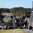 tow truck next to a crashed semi-truck