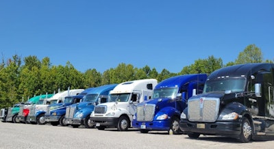 C.W. Express trucks parked at yard