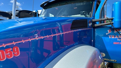 Barbed wire on hood of Tyler Pyke's 2016 Kenworth T880