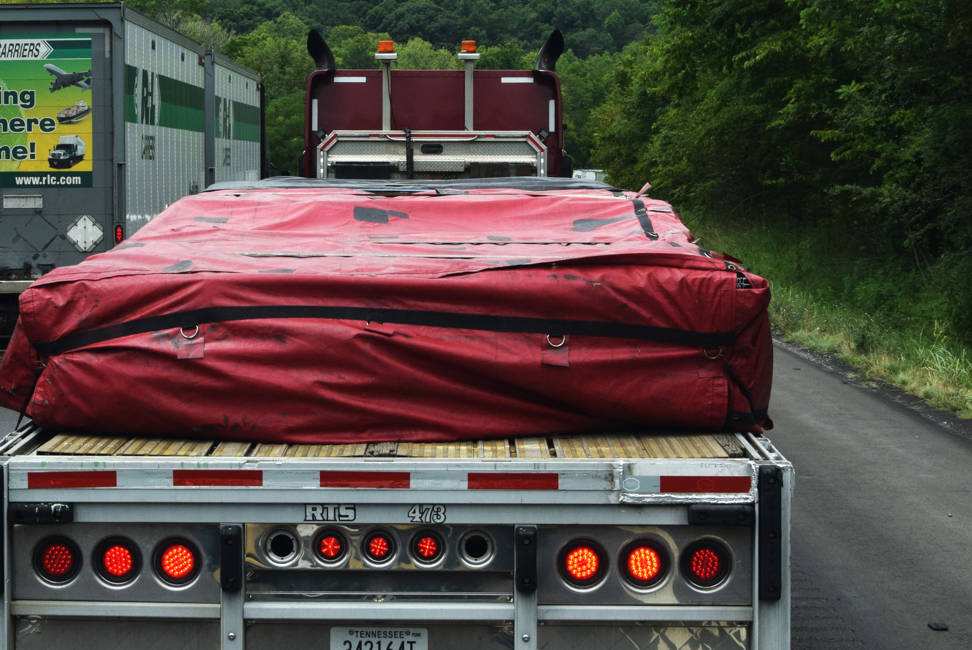 Loaded Flatbed Stuck In Crash Traffic
