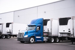 Daycab truck backed to dock