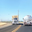 Tanker Hay Wagon On Highway