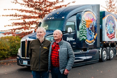 Combined, the two drivers -- John Schank (left) and Fred Austin -- have more than 10 million combined safe miles and nearly 100 years of trucking experience behind them.