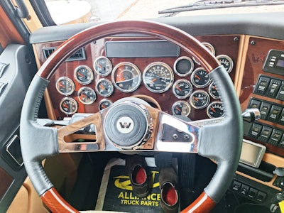 View of the instrument cluster, steering wheel from the driver's seat.