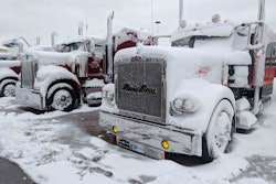 snow-covered semi trucks