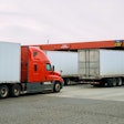 trucks backed up at fuel island