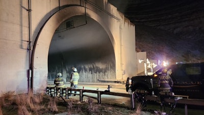 Firefighters outside of Wyoming I-80 tunnel crash site
