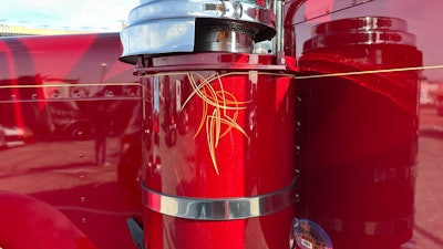 Pinstriping on Robert Baesel's 2024 Peterbilt 389