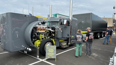 Josh Reed's 2013 Peterbilt 389/Mac flatbed/conestoga