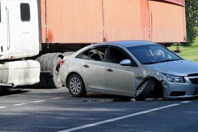 collision between a truck and a car