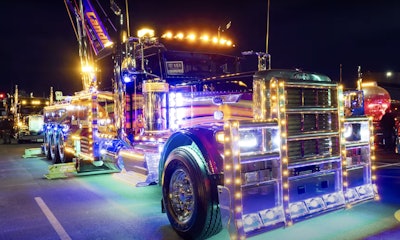 Candido's Towing & Recovery's 2024 Peterbilt 389X wrecker won first place in the Working Truck -- Bobtail, Lights category.