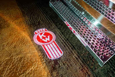 The door projector light shines the old-school Kenworth logo on the ground when the door is open.